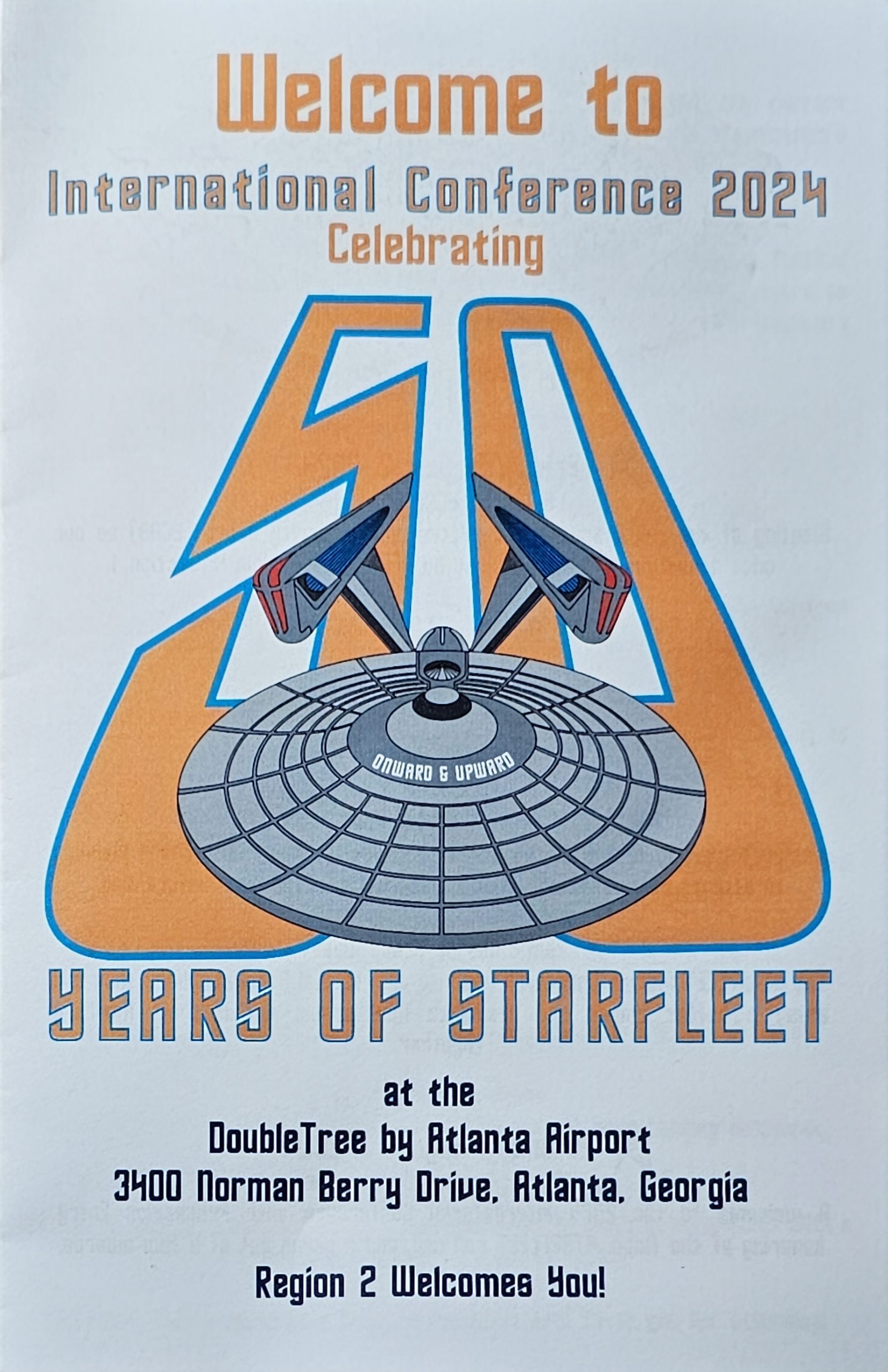 STARFLEET INTERNATIONAL CONVERENCE 2024 Program Cover, celebrating Starfleet's 50 years with ship flighing down the 50 years toward you.